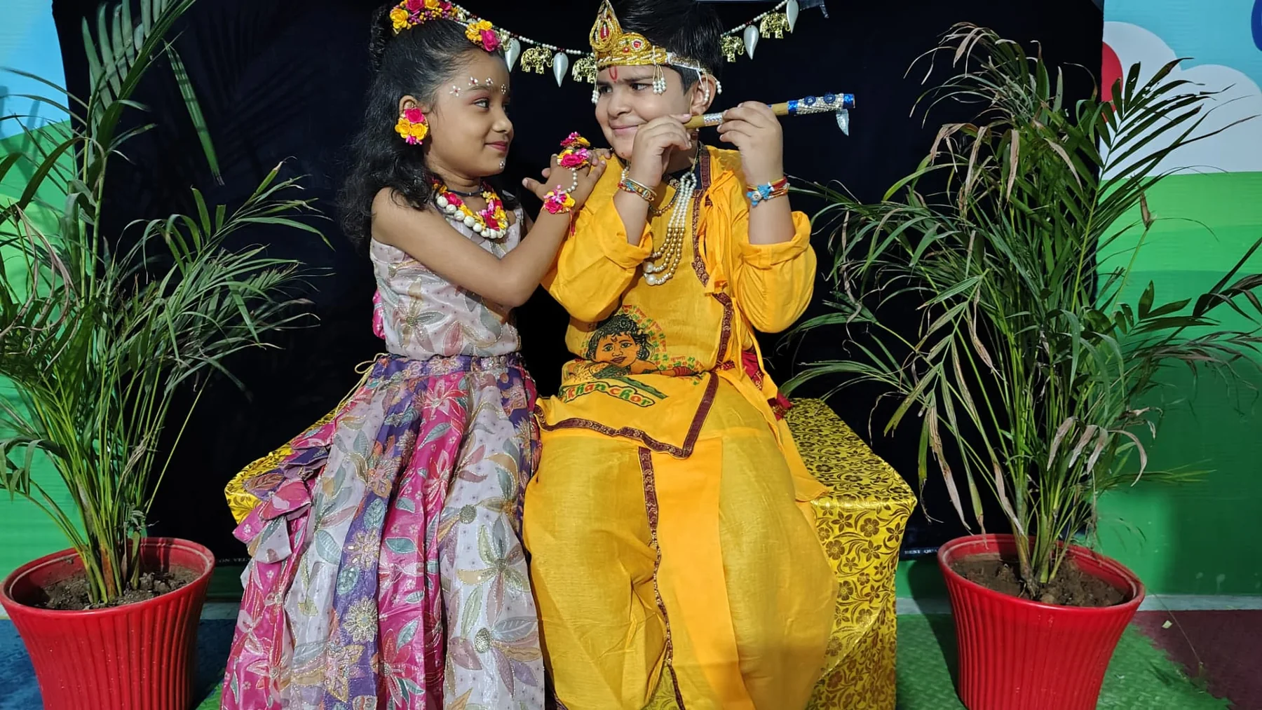 Science Academy students performing as Radha and Krishna