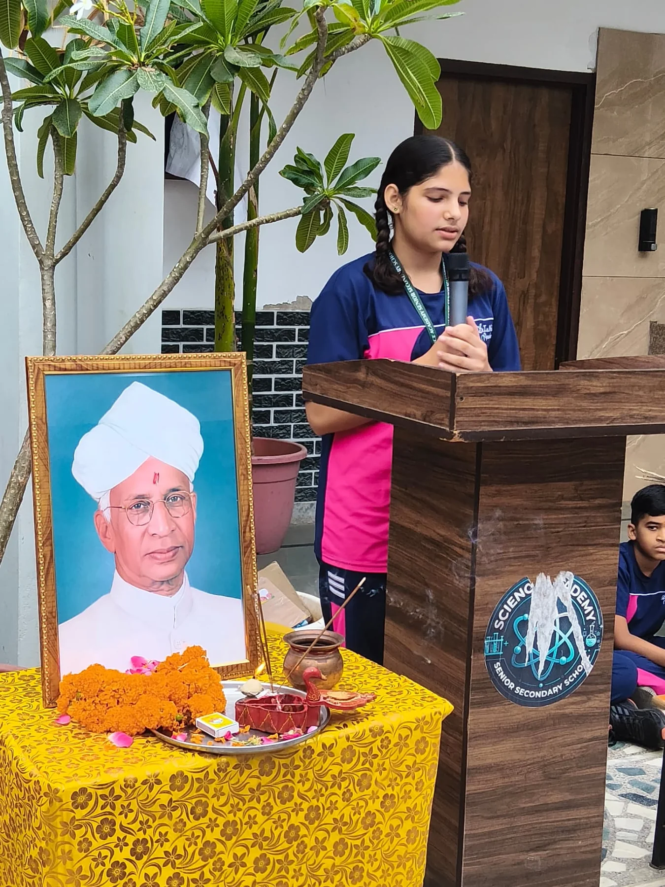 Science Academy student speaking during Teacher's Day