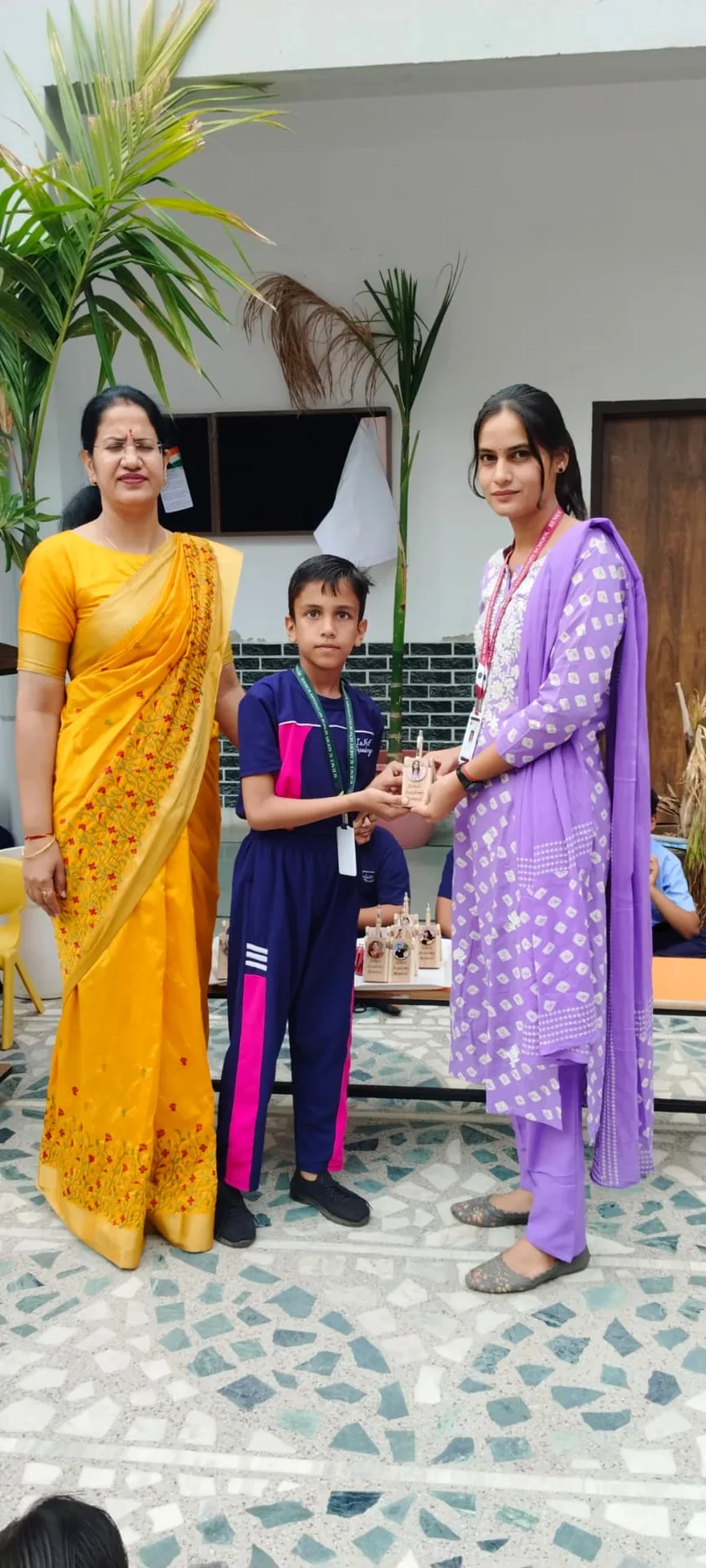 Science Academy teacher and student celebrating achievement